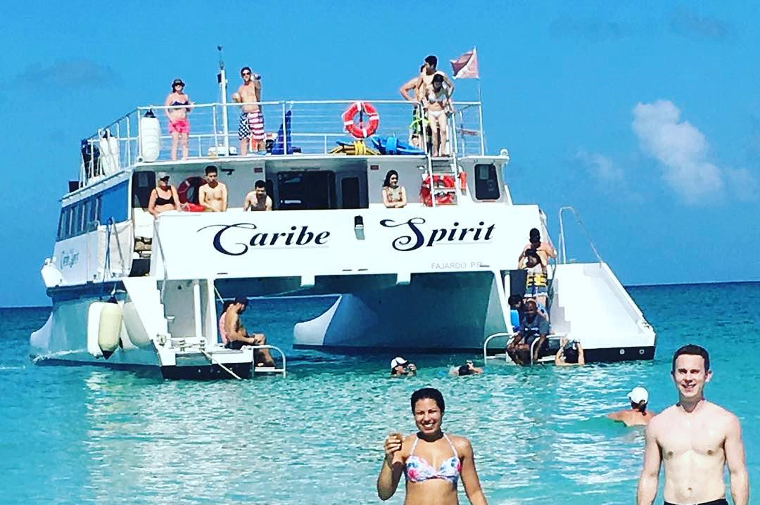 Catamaran anchored in turquoise water off Icacos Island, private yacht charter Puerto Rico